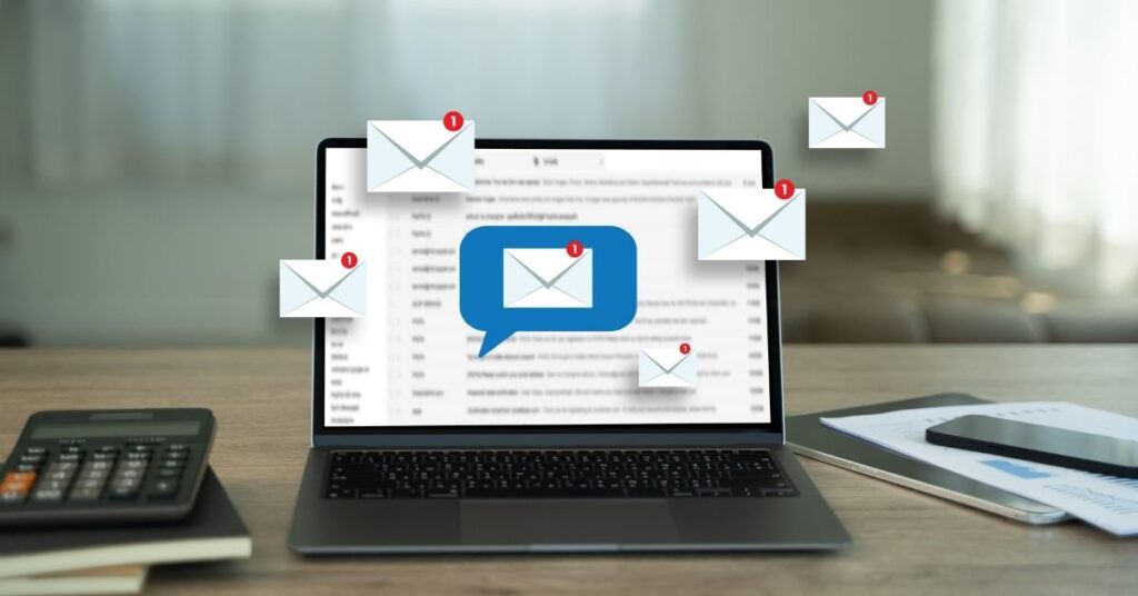 Emails pop out of a laptop screen.