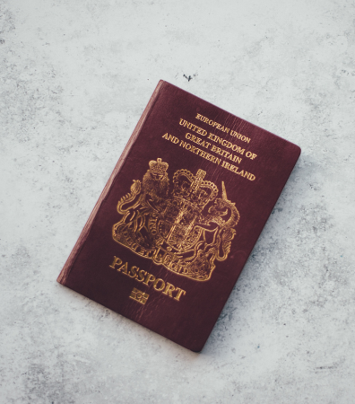 An old burgundy UK passport.