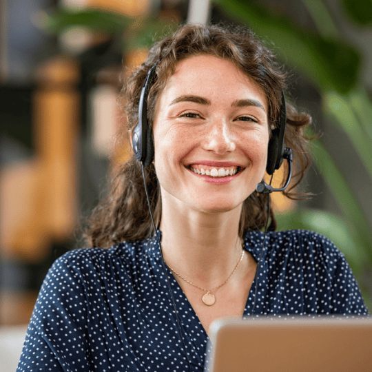 A smiling customer support agent.