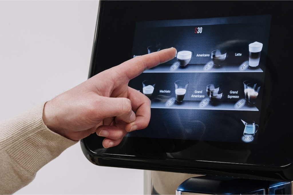 An automatic coffee machine, representing the march of automation.